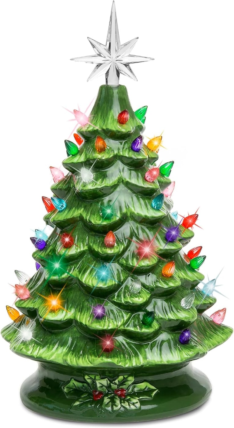 Hand-painted ceramic Christmas tree with colorful lights and a star topper on a white background