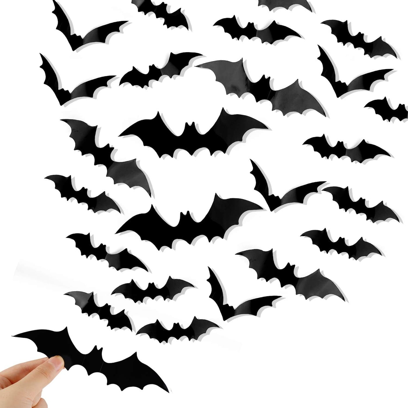 120-piece set of matte black 3D bat wall stickers in different wing sizes displayed on a white wall