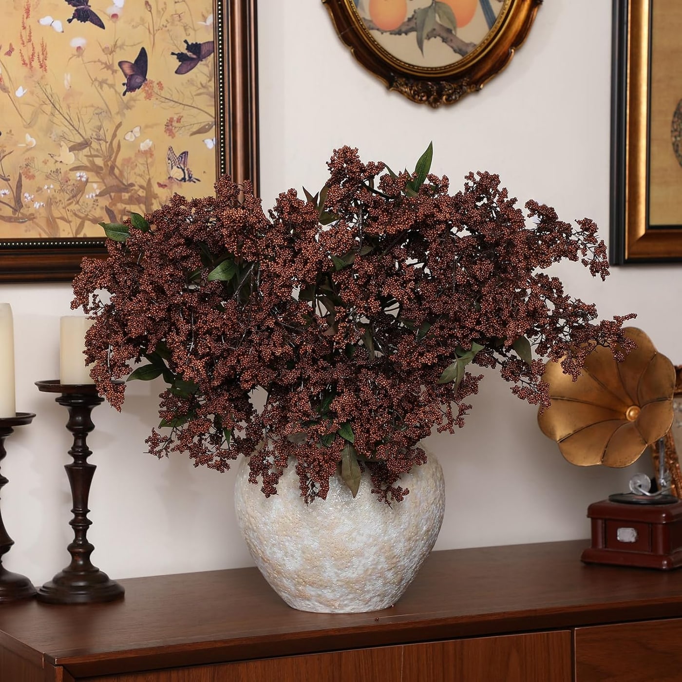 Three tall faux sedum berry stems with realistic clustered berries in dark brown, arranged in a floor vase