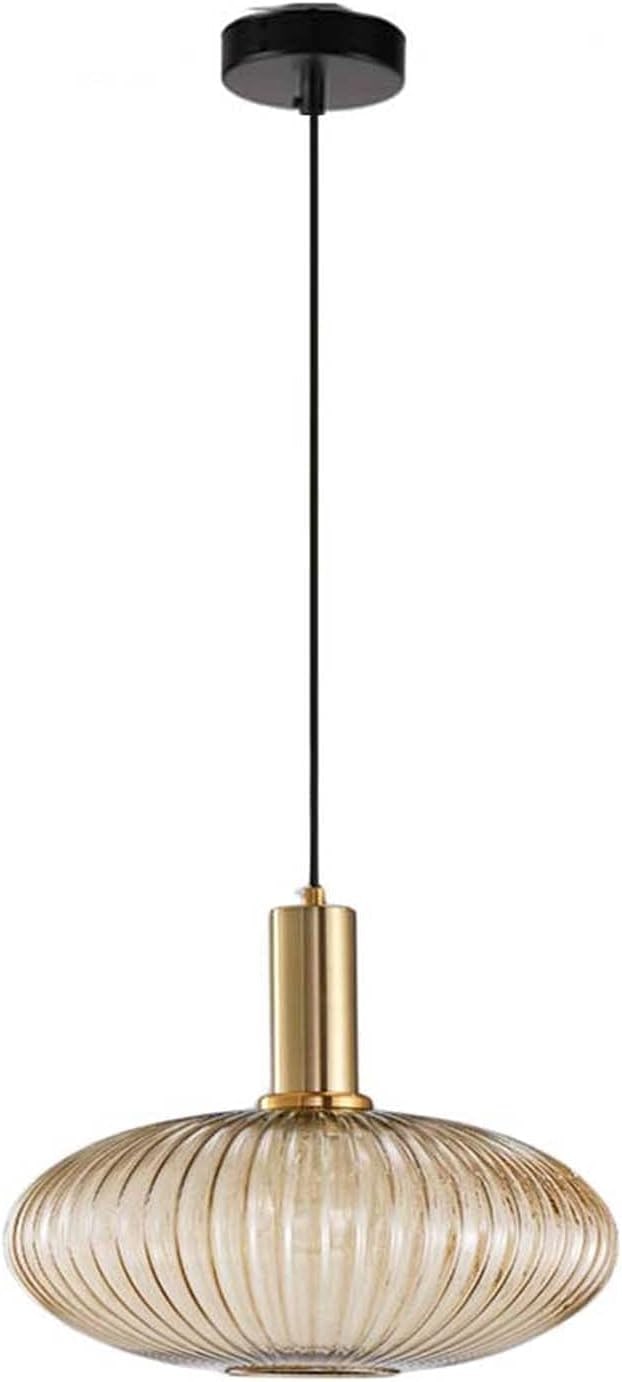 Amber glass pendant light with a rounded shade and gold copper socket, suspended by an adjustable cord