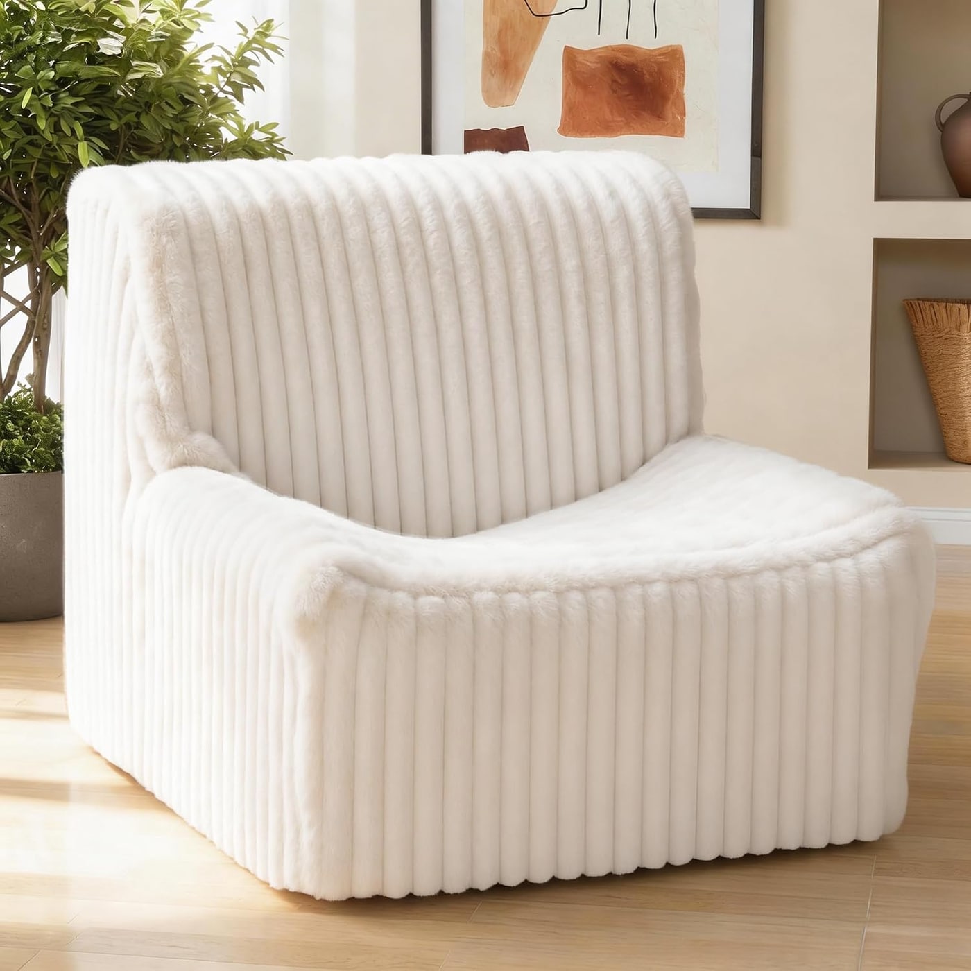 A wide, armless memory foam accent chair with plush faux fur upholstery in a neutral color.