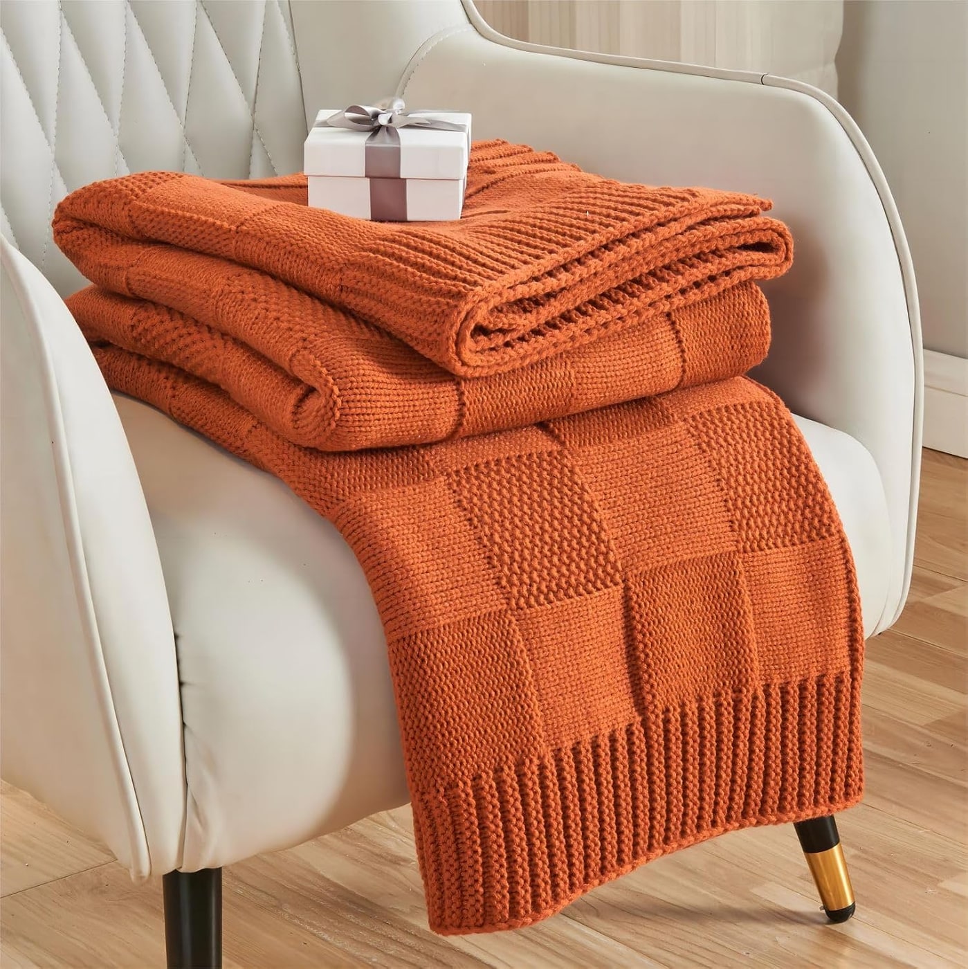 CozeCube chunky checkered knit throw blanket folded, showing homespun texture and checkered pattern