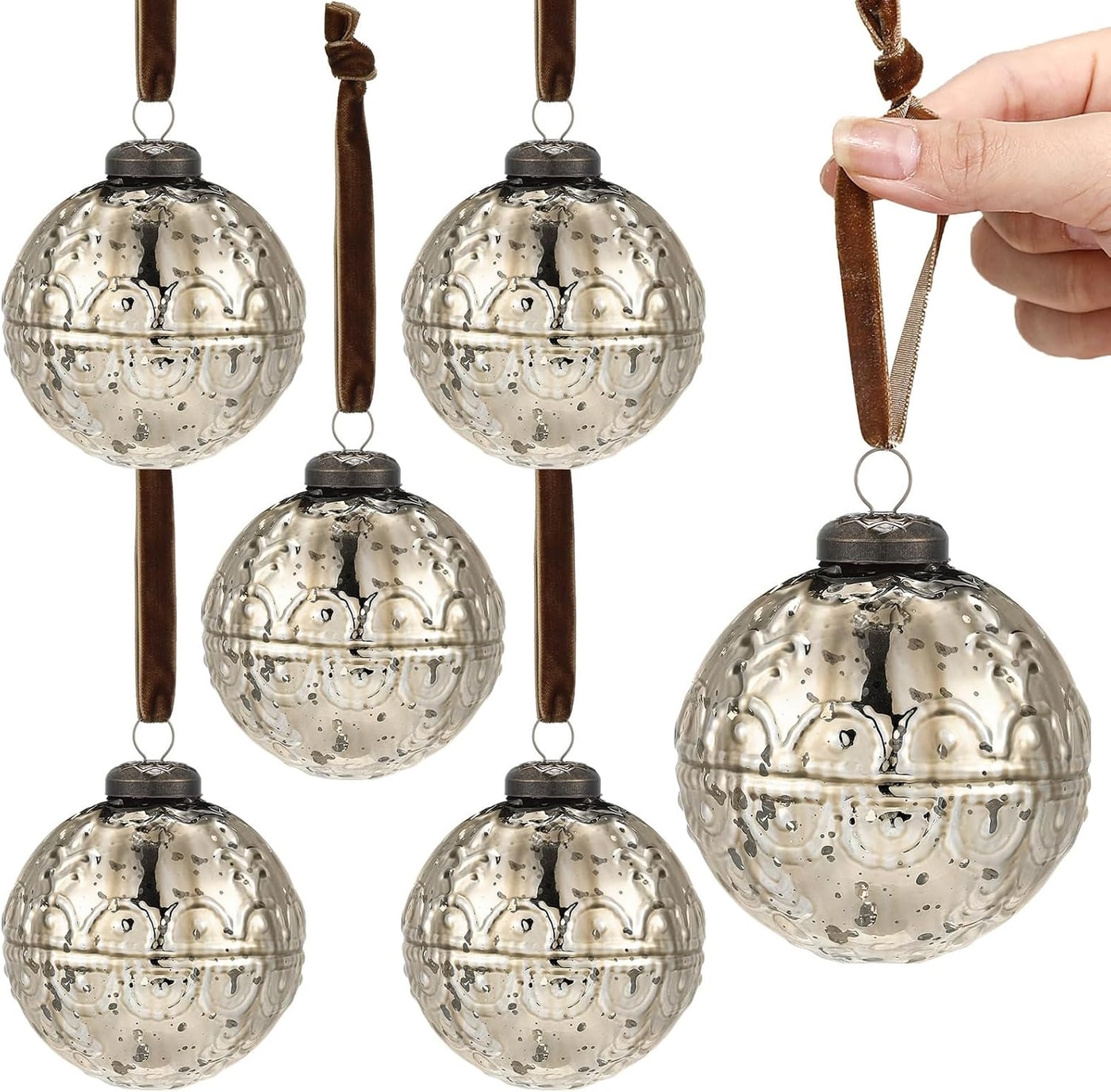Set of six embossed mercury glass ball ornaments in champagne gold, each hung on brown velvet ribbon