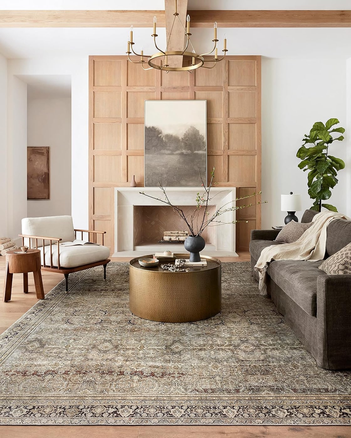 Olive and charcoal low-pile flat weave area rug with distressed oriental pattern.