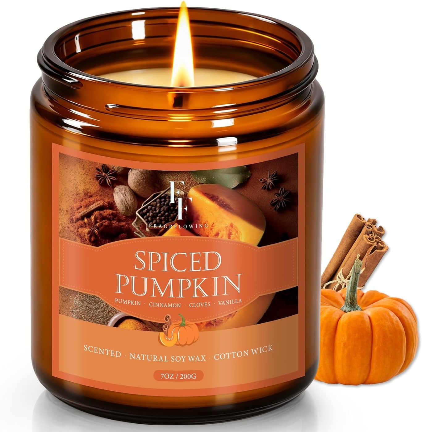 Natural soy fall candle in amber glass jar with cotton wick and spiced pumpkin label