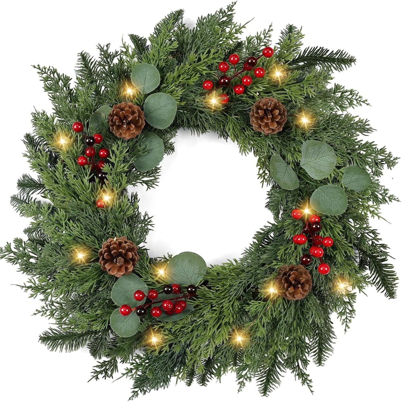 24-inch pre-lit pine Christmas wreath with realistic greenery, pine cones, and red berries, hung on a classic front door
