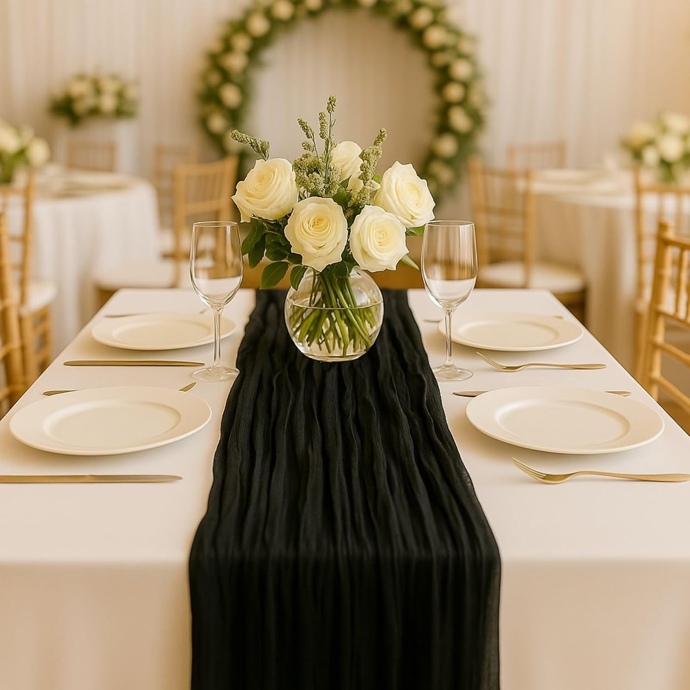 Soft gauze cheesecloth table runner draped across a table, pooling slightly at the ends, shown in a deep neutral color