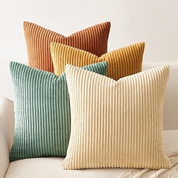 Four soft velvet corduroy throw pillow covers in assorted colors, each with reversible patterns, neatly arranged to show both sides.