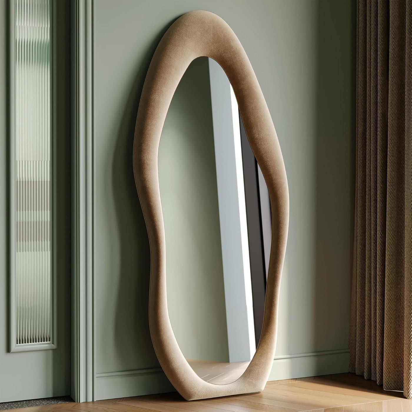 Honyee Wavy Flannel Full-Length Mirror showing irregular wavy silhouette with soft, sponge-filled flannel frame, leaned against a wall